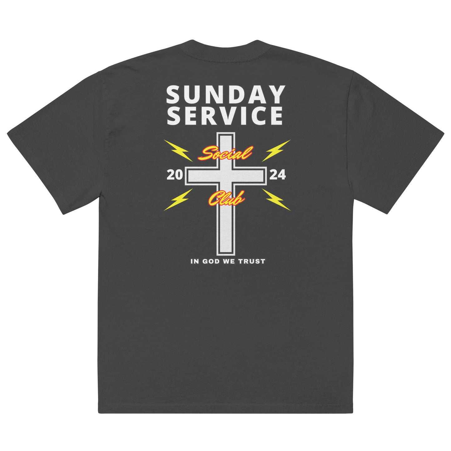 Back of a black t-shirt featuring a large white cross in the center with the words 'Social Club' in red cursive text layered over the cross. Surrounding the cross are yellow lightning bolts on either side, with '20' on the left and '24' on the right. The bold white text 'SUNDAY SERVICE' is displayed above the cross, and the phrase 'IN GOD WE TRUST' is positioned at the bottom in smaller, white block letters.